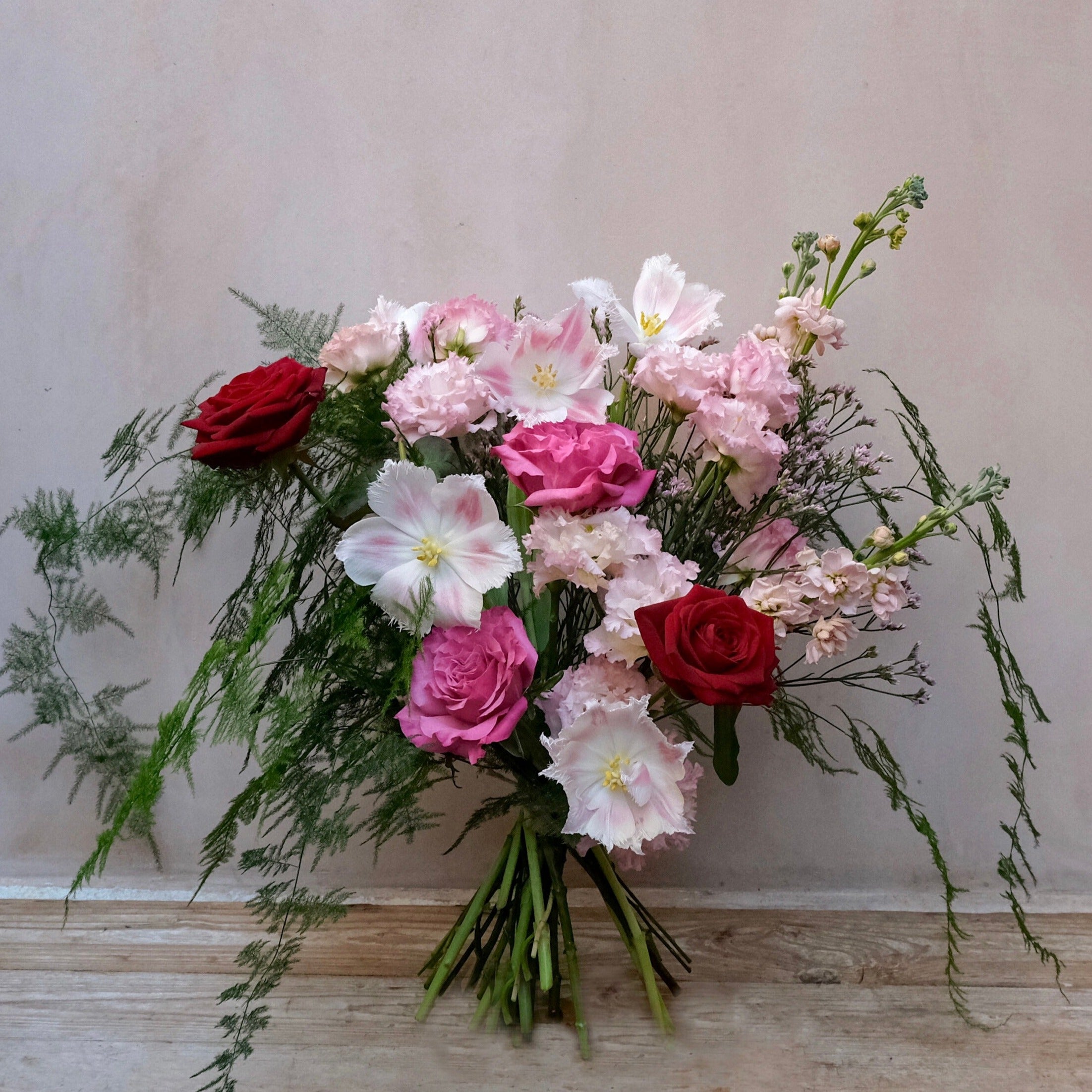 Valentine's Day gift set with red pink roses bouquet candle and jar of bath salts